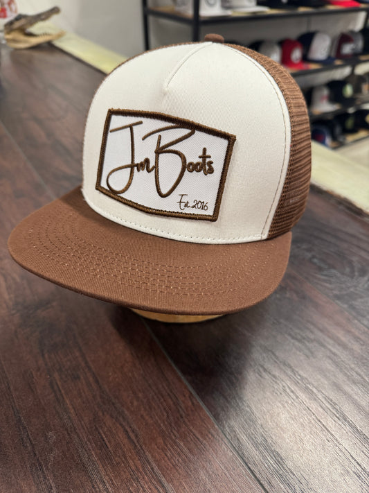 JM Signature brown and white